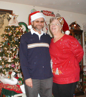 Jeanne & Jerry by the tree - Christmas 2002 in Vallejo