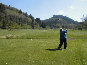 playing golf at Sunset Bay